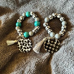 Custom made keyring bracelets. Bead colors and design can be picked.